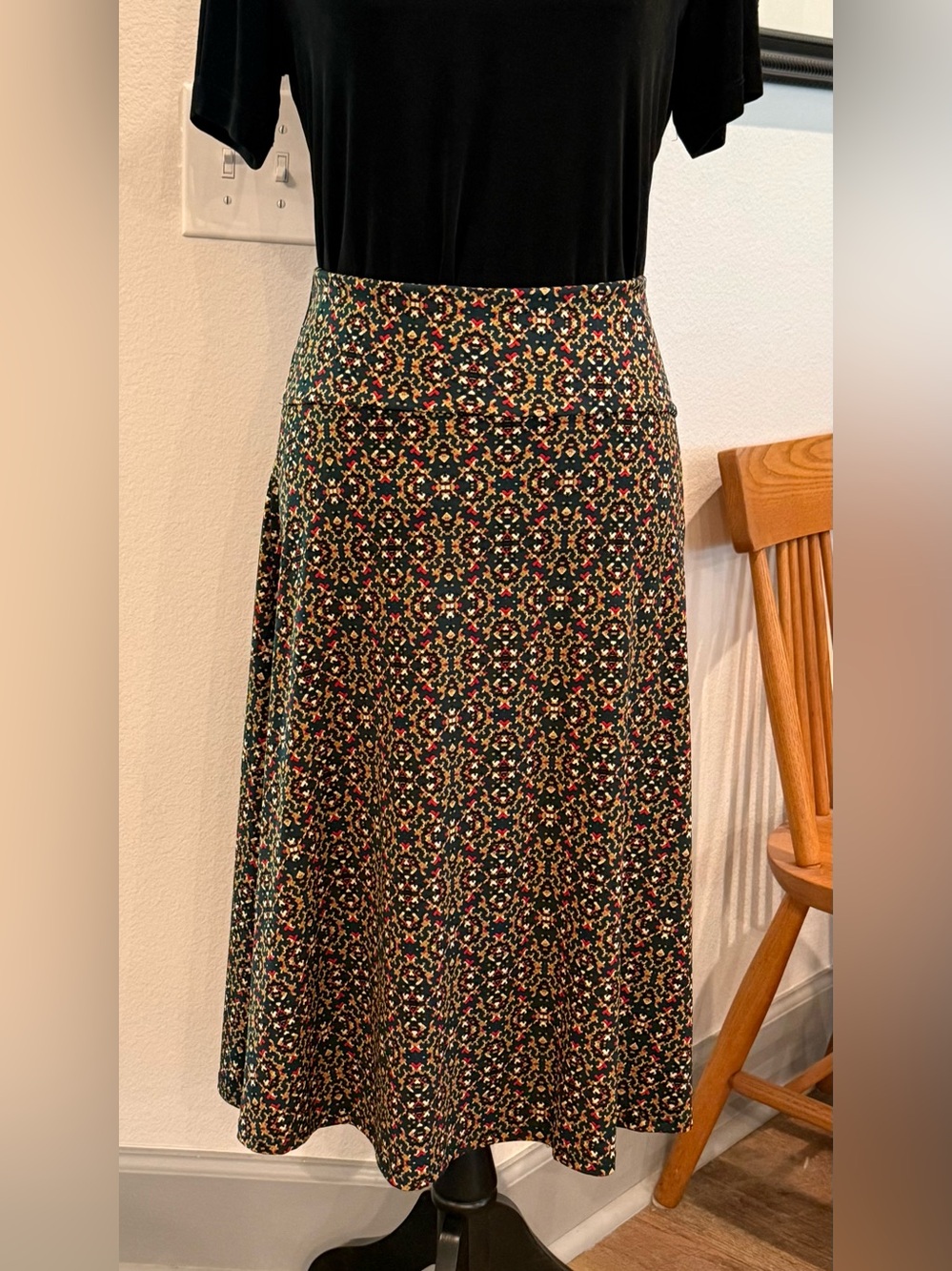 LuLaRoe Midi Skirt in Black with Red, Green and Gold Pattern